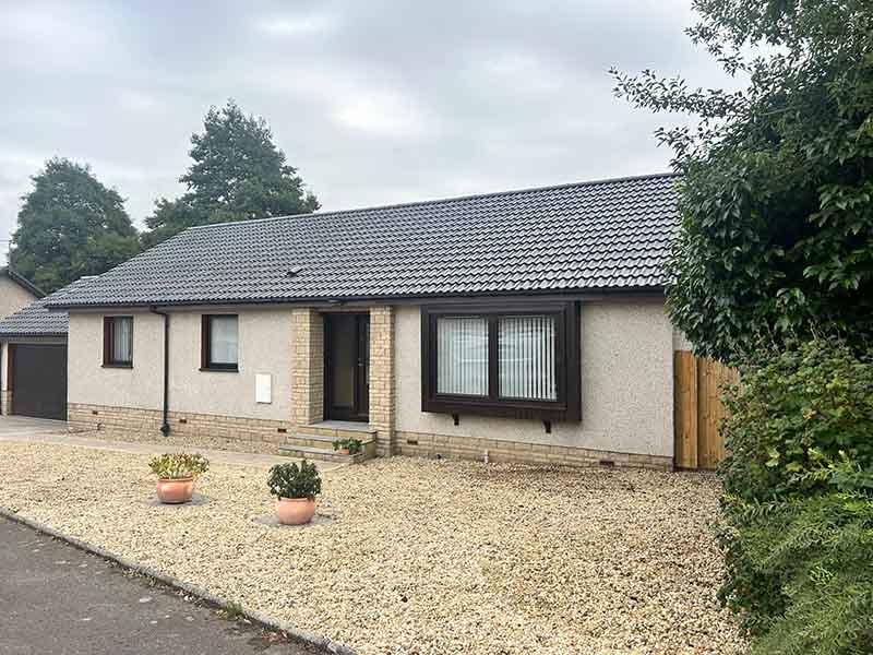 Roof Coating Protection for this Ayr Bungalow